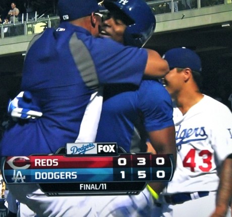 Matt Kemp greets Yasiel Puig after his walk-off home run.