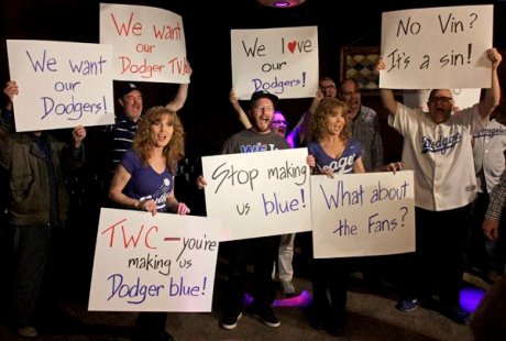 Dodger fans rallying to voice their protest on the Time Warner deal at Short Stop bar in Echo Park on Apr. 16, 2014. (Lawrence K. Ho/Los Angeles Times)